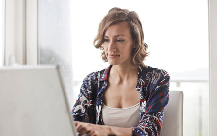 Female marketer sitting and working