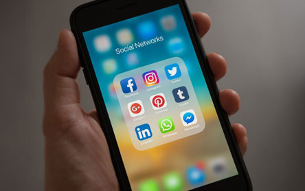 iPhone displaying different social media icons